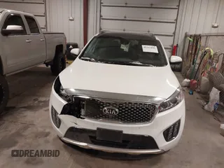 2018 Kia Sorento SX with VIN 5XYPKDA55JG388400, listed as a IAAI auction lot 41332048 with 70,153 mi miles and . Bid and sale history available at DreamBid. Image 6.