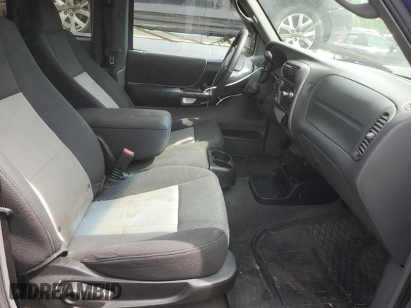 2006 Ford Ranger XL z VIN 1FTZR15EX6PA75411, wystawiony jako Copart lot #58711315 z przebiegiem 153 555 mil mil oraz Czysty tytuł • Clean title. Historia ofert i sprzedaży dostępna na DreamBid. Obrazek 10.