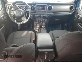 2023 Jeep Wrangler Sport S with VIN 1C4HJXDN5PW573692, listed as a Copart auction lot 42982875 with 25,584 mi miles and Salvage Title. Bid and sale history available at DreamBid. Image 8.