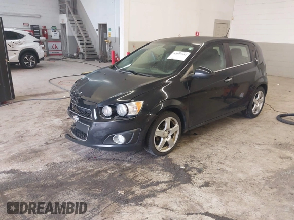 2016 Chevrolet Sonic LTZ z VIN 1G1JE6SB3G4150803, wystawiony jako IAAI lot #42007951 z przebiegiem 124 811 mil mil oraz . Historia ofert i sprzedaży dostępna na DreamBid. Obrazek 17.