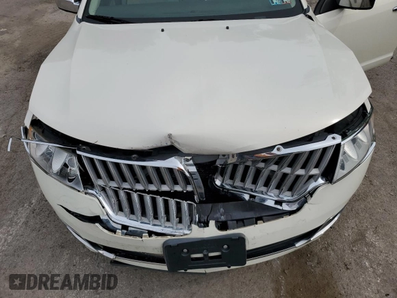 2012 Lincoln MKZ with VIN 3LNHL2JCXCR800433, listed as a Copart auction lot 64657415 with 172,437 mi miles and Salvage title. Bid and sale history available at DreamBid. Image 11.