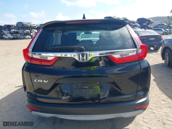 2017 Honda CR-V LX with VIN 7FARW5H33HE001050, listed as a IAAI auction lot 41944571 with 61,159 mi miles. Bid and sale history available at carsss.com. Image 16.