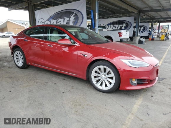 2017 Tesla Model S 100D with VIN 5YJSA1E29HF229425, listed as a Copart auction lot 54602195 with 128,886 mi miles and Salvage Title. Bid and sale history available at DreamBid. Image 4.