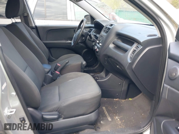 2009 Kia Sportage LX with VIN KNDJF724397572311, listed as a IAAI auction lot 41902158 with 120,899 mi miles and . Bid and sale history available at carsss.com. Image 5.