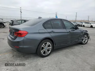 2016 BMW 3 Series 328i with VIN WBA8E9G51GNT42237, listed as a Copart auction lot 59909605 with 117,908 mi miles and Salvage title. Bid and sale history available at DreamBid. Image 3.