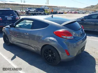 2015 Hyundai Veloster with VIN KMHTC6AD1FU233648, listed as a IAAI auction lot 41822881 with 162,368 mi miles. Bid and sale history available at carsss.com. Image 3.