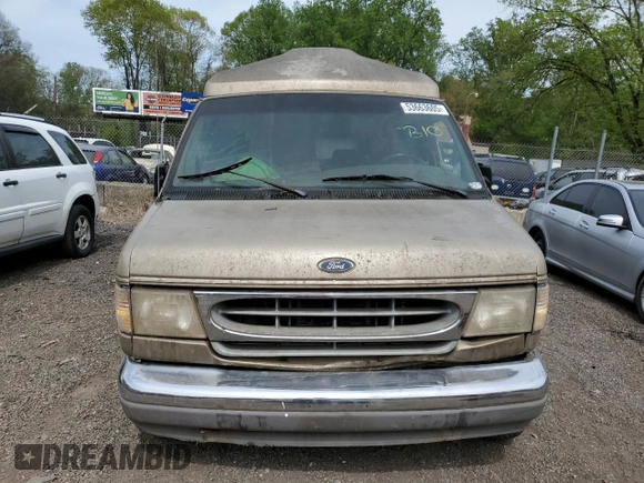 1999 Ford Econoline Cargo with VIN 1FDRE14W5XHB75137, listed as a Copart auction lot 53663605 with 147,149 mi miles and Salvage Title. Bid and sale history available at carsss.com. Image 5.