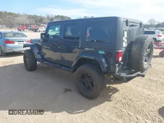 2017 Jeep Wrangler Unlimited Sahara with VIN 1C4BJWEG6HL735431, listed as a IAAI auction lot 41700357 with 100,035 mi miles. Bid and sale history available at carsss.com. Image 3.