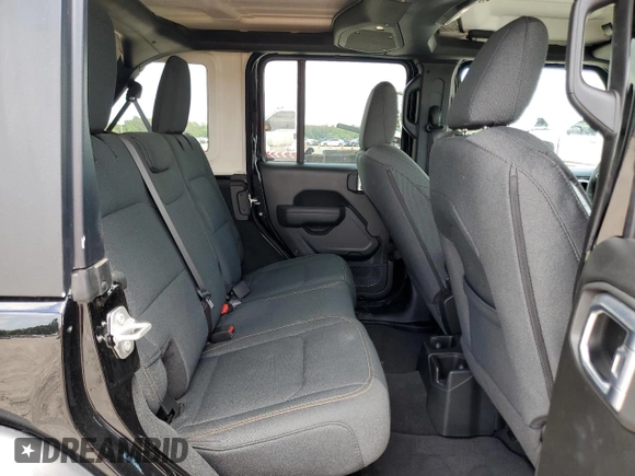 2024 Jeep Wrangler Sport S with VIN 1C4PJXDNXRW349946, listed as a Copart auction lot 56701185 with 6,310 mi miles and Salvage Title. Bid and sale history available at DreamBid. Image 11.