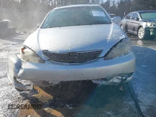 2003 Toyota Camry LE z VIN 4T1BF32K03U561492, wystawiony jako IAAI lot #41607321 z przebiegiem 171 920 mil mil oraz . Historia ofert i sprzedaży dostępna na DreamBid. Obrazek 12.