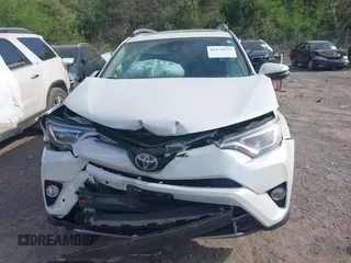 2017 Toyota RAV4 Limited with VIN 2T3YFREV8HW322208, listed as a IAAI auction lot 41974231 with 74,027 mi miles. Bid and sale history available at carsss.com. Image 6.