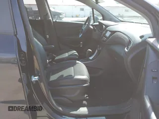 2022 Chevrolet Trax LT with VIN KL7CJPSM7NB568709, listed as a IAAI auction lot 42061802 with 28,995 mi miles and . Bid and sale history available at DreamBid. Image 5.
