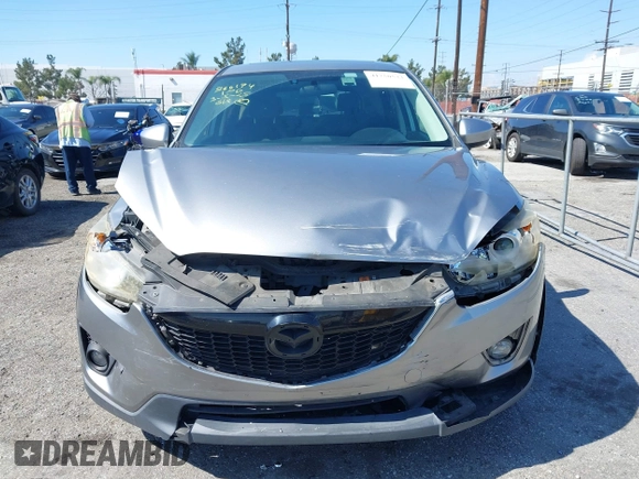 2014 Mazda CX-5 Grand Touring with VIN JM3KE2DY0E0331942, listed as a IAAI auction lot 41750533 with 163,387 mi miles. Bid and sale history available at carsss.com. Image 12.