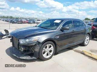 2018 Ford Taurus SEL z VIN 1FAHP2E81JG111809, wystawiony jako IAAI lot #42228720 z przebiegiem 83 532 mil mil oraz . Historia ofert i sprzedaży dostępna na DreamBid. Obrazek 2.