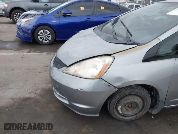 2009 Honda Fit with VIN JHMGE88279S055565, listed as a IAAI auction lot 41896359 with 184,618 mi miles. Bid and sale history available at carsss.com. Image 6.
