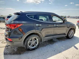 2018 Hyundai Santa Fe 2.4L с VIN 5XYZU3LB9JG535186, выставлен на аукционе Copart как лот 60098585 с пробегом 105 128 миль миль и Списание • Salvage title. История ставок и продаж доступна на DreamBid. Изображение 3.