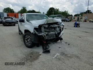2021 GMC Canyon 4WD AT4 z VIN 1GTG6FEN9M1147406, wystawiony jako Copart lot #55454634 z przebiegiem 82 898 mil mil oraz Szkody całkowita. Historia ofert i sprzedaży dostępna na DreamBid. Obrazek 11.