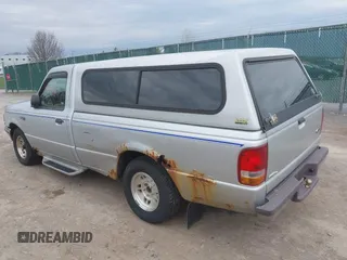1997 Ford Ranger XL with VIN 1FTCR10U8VPA00709, listed as a IAAI auction lot 42071941 with 153,501 mi miles. Bid and sale history available at carsss.com. Image 3.