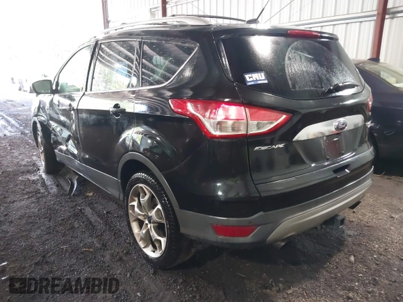 2015 Ford Escape Titanium with VIN 1FMCU9J98FUB00525, listed as a IAAI auction lot 42547989 with 194,040 mi miles and . Bid and sale history available at DreamBid. Image 3.