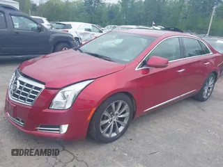 2013 Cadillac XTS Luxury z VIN 2G61R5S38D9229278, wystawiony jako IAAI lot #42321672 z przebiegiem 89 537 mil mil oraz . Historia ofert i sprzedaży dostępna na DreamBid. Obrazek 2.