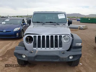 2020 Jeep Gladiator Sport S with VIN 1C6HJTAG1LL141165, listed as a IAAI auction lot 42013668 with 176,107 mi miles. Bid and sale history available at carsss.com. Image 12.