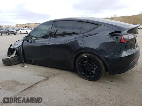 2024 Tesla Model Y Long Range with VIN 7SAYGAEE5RF038446, listed as a Copart auction lot 48868025 with 10,410 mi miles and Salvage Title. Bid and sale history available at DreamBid. Image 2.
