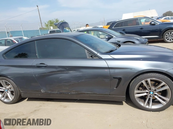 2014 BMW 4 Series 428i with VIN WBA3N7C5XEF718428, listed as a IAAI auction lot 42043910 with 157,686 mi miles and . Bid and sale history available at DreamBid. Image 14.