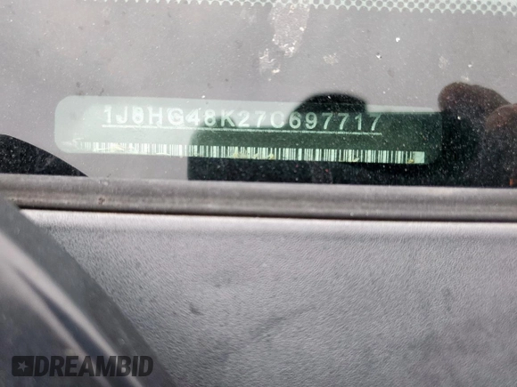 2007 Jeep Commander Sport z VIN 1J8HG48K27C697717, wystawiony jako Copart lot #53550395 z przebiegiem 288 452 mil mil oraz Szkoda całkowita • Salvage title. Historia ofert i sprzedaży dostępna na DreamBid. Obrazek 13.