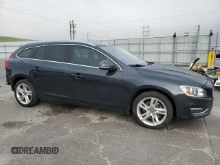2015 Volvo V60 with VIN YV1612SB5F1186312, listed as a Copart auction lot 58552405 with 77,610 mi miles and Salvage title. Bid and sale history available at DreamBid. Image 4.