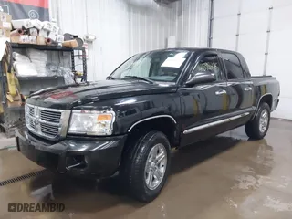 2008 Dodge Dakota Laramie with VIN 1D7HW58N58S613946, listed as a IAAI auction lot 41598426 with 114,272 mi miles. Bid and sale history available at carsss.com. Image 19.