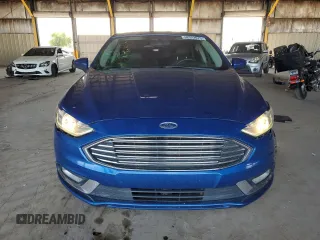 2017 Ford Fusion SE z VIN 3FA6P0H90HR157957, wystawiony jako Copart lot #58322975 z przebiegiem 114 128 mil mil oraz Szkoda całkowita • Salvage title. Historia ofert i sprzedaży dostępna na DreamBid. Obrazek 5.