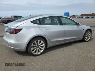 2018 Tesla Model 3 Long Range Battery with VIN 5YJ3E1EB8JF091116, listed as a Copart auction lot 43281485 with 58,677 mi miles and Salvage Title. Bid and sale history available at DreamBid. Image 3.