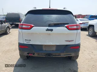 2015 Jeep Cherokee Trailhawk z VIN 1C4PJMBS5FW574102, wystawiony jako IAAI lot #42278805 z przebiegiem 164 250 mil mil oraz . Historia ofert i sprzedaży dostępna na DreamBid. Obrazek 17.