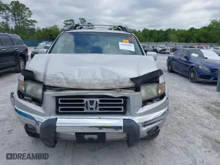 2008 Honda Ridgeline RTL with VIN 2HJYK16568H527114, listed as a IAAI auction lot 42042902 with 127,159 mi miles. Bid and sale history available at carsss.com. Image 12.