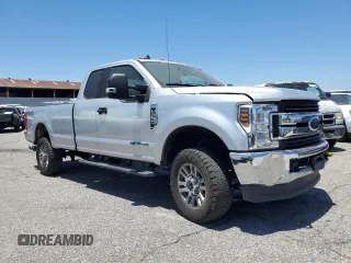 2019 Ford F-350 XL with VIN 1FT8X3BT0KEE13291, listed as a Copart auction lot 62368685 with 114,389 mi miles and Salvage title. Bid and sale history available at DreamBid. Image 4.