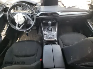 2021 Mazda CX-9 Sport with VIN JM3TCBBY5M0502888, listed as a Copart auction lot 61299673 with 50,576 mi miles and . Bid and sale history available at DreamBid. Image 8.