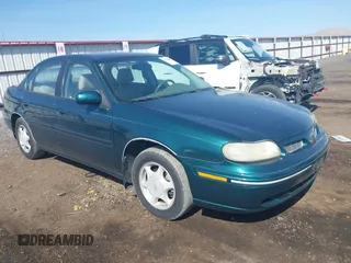 1999 Oldsmobile Cutlass GLS z VIN 1G3NG52J9X6340436, wystawiony jako IAAI lot #42164912 z przebiegiem 122 290 mil mil oraz . Historia ofert i sprzedaży dostępna na DreamBid. Obrazek 1.