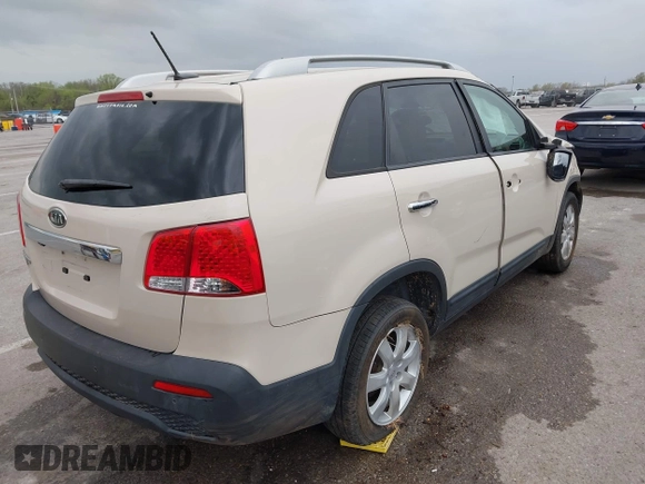 2011 Kia Sorento LX with VIN 5XYKT3A15BG048499, listed as a IAAI auction lot 41931974 with 164,221 mi miles and . Bid and sale history available at DreamBid. Image 4.