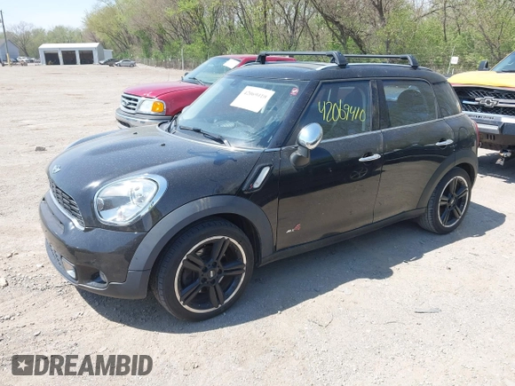 2011 MINI Countryman S with VIN WMWZC5C50BWL53922, listed as a IAAI auction lot 42069410 with 66,797 mi miles and . Bid and sale history available at DreamBid. Image 2.