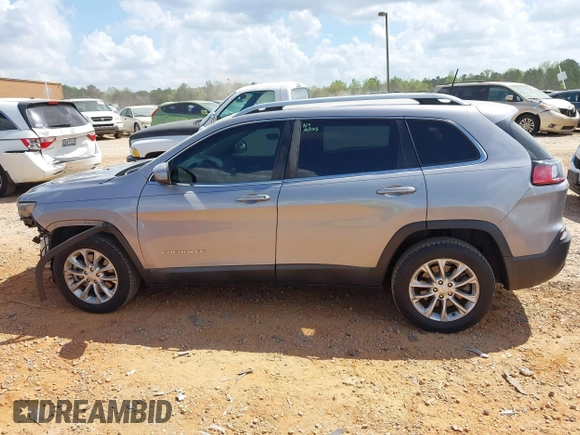 2019 Jeep Cherokee Latitude with VIN 1C4PJLCX7KD220799, listed as a IAAI auction lot 41970875 with 104,394 mi miles and . Bid and sale history available at DreamBid. Image 14.