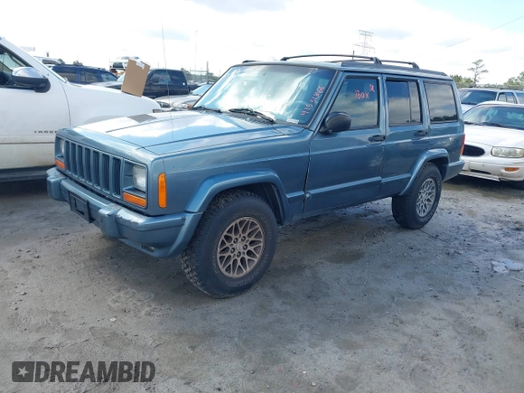 1998 Jeep Cherokee Sport with VIN 1J4FT68S0WL125382, listed as a IAAI auction lot 41551866 with 1 mi miles. Bid and sale history available at carsss.com. Image 2.