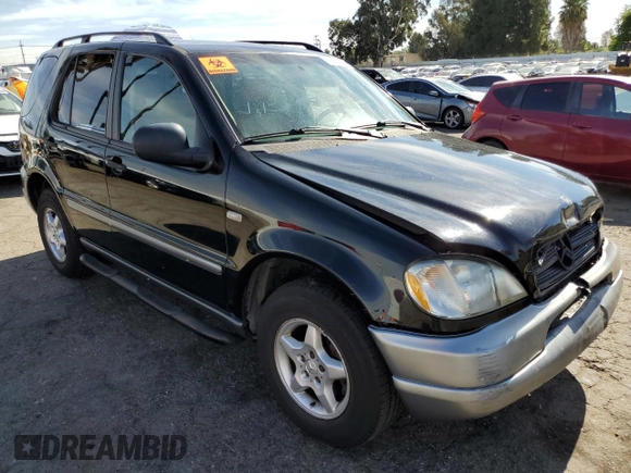 1999 Mercedes-Benz M-Class with VIN 4JGAB54E6XA141592, listed as a Copart auction lot 79514124 with 0 mi miles and Salvage Title. Bid and sale history available at carsss.com. Image 4.