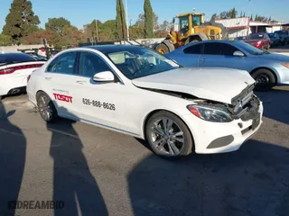 2015 Mercedes-Benz C-Class C 300 with VIN 55SWF4JB3FU074019, listed as a IAAI auction lot 40774389 with 104,091 mi miles. Bid and sale history available at carsss.com. Image 1.