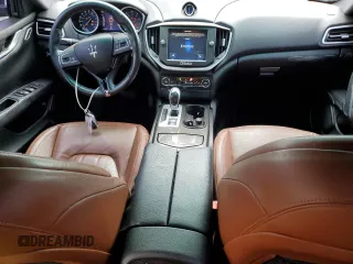 2015 Maserati Ghibli z VIN ZAM57XSA7F1148872, wystawiony jako Copart lot #48454165 z przebiegiem 72 232 mil mil oraz Szkoda całkowita • Salvage title. Historia ofert i sprzedaży dostępna na DreamBid. Obrazek 8.