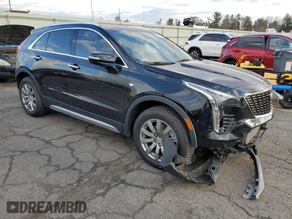 2021 Cadillac XT4 AWD Premium Luxury with VIN 1GYFZDR4XMF016846, listed as a Copart auction lot 82963704 with 44,063 mi miles and Salvage Title. Bid and sale history available at carsss.com. Image 4.
