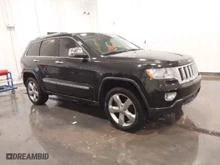 2011 Jeep Grand Cherokee Overland with VIN 1J4RR6GT7BC607735, listed as a IAAI auction lot 41830669 with 98,161 mi miles. Bid and sale history available at carsss.com. Image 1.
