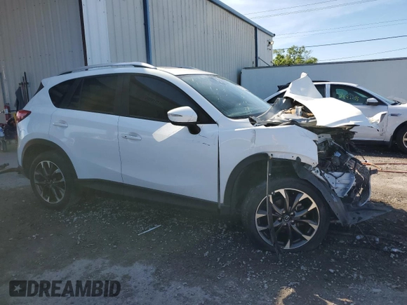 2016 Mazda CX-5 Grand Touring with VIN JM3KE4DY4G0669259, listed as a Copart auction lot 50470145 with 0 mi miles and Non Repairable. Bid and sale history available at carsss.com. Image 4.