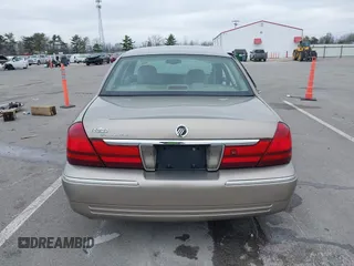 2004 Mercury Grand Marquis LS Premium z VIN 2MEFM75W14X643516, wystawiony jako IAAI lot #42007171 z przebiegiem 213 531 mil mil oraz . Historia ofert i sprzedaży dostępna na DreamBid. Obrazek 16.