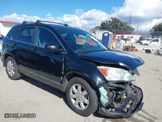 2009 Honda CR-V EX-L with VIN 5J6RE38759L023937, listed as a IAAI auction lot 41736422 with 137,577 mi miles. Bid and sale history available at carsss.com. Image 1.