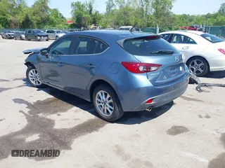 2015 Mazda 3 i Touring with VIN 3MZBM1L79FM187074, listed as a IAAI auction lot 42147375 with 23,394 mi miles and . Bid and sale history available at DreamBid. Image 3.